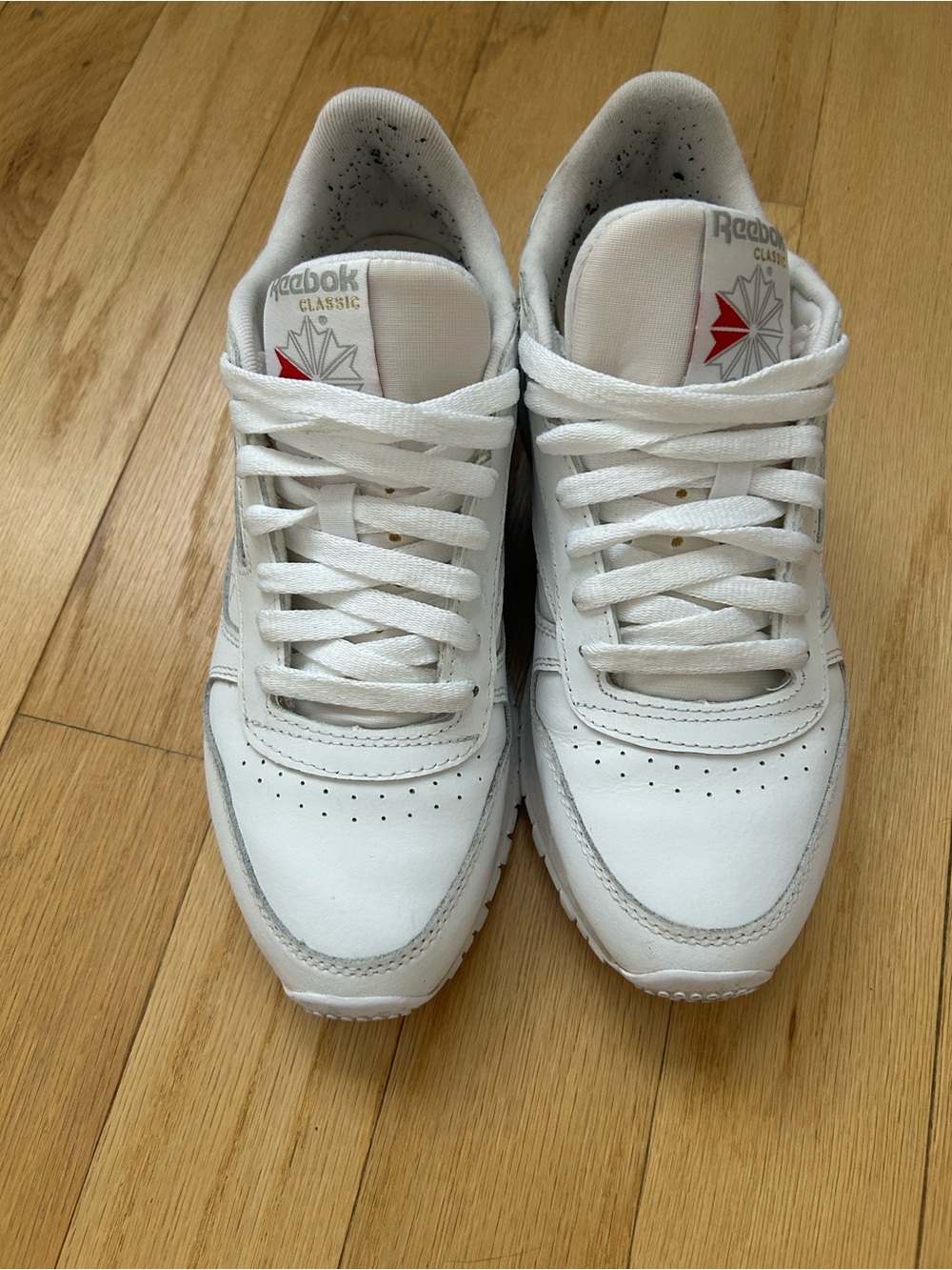 Reebok Classic White Leather Sneakers with Red Logo Accent